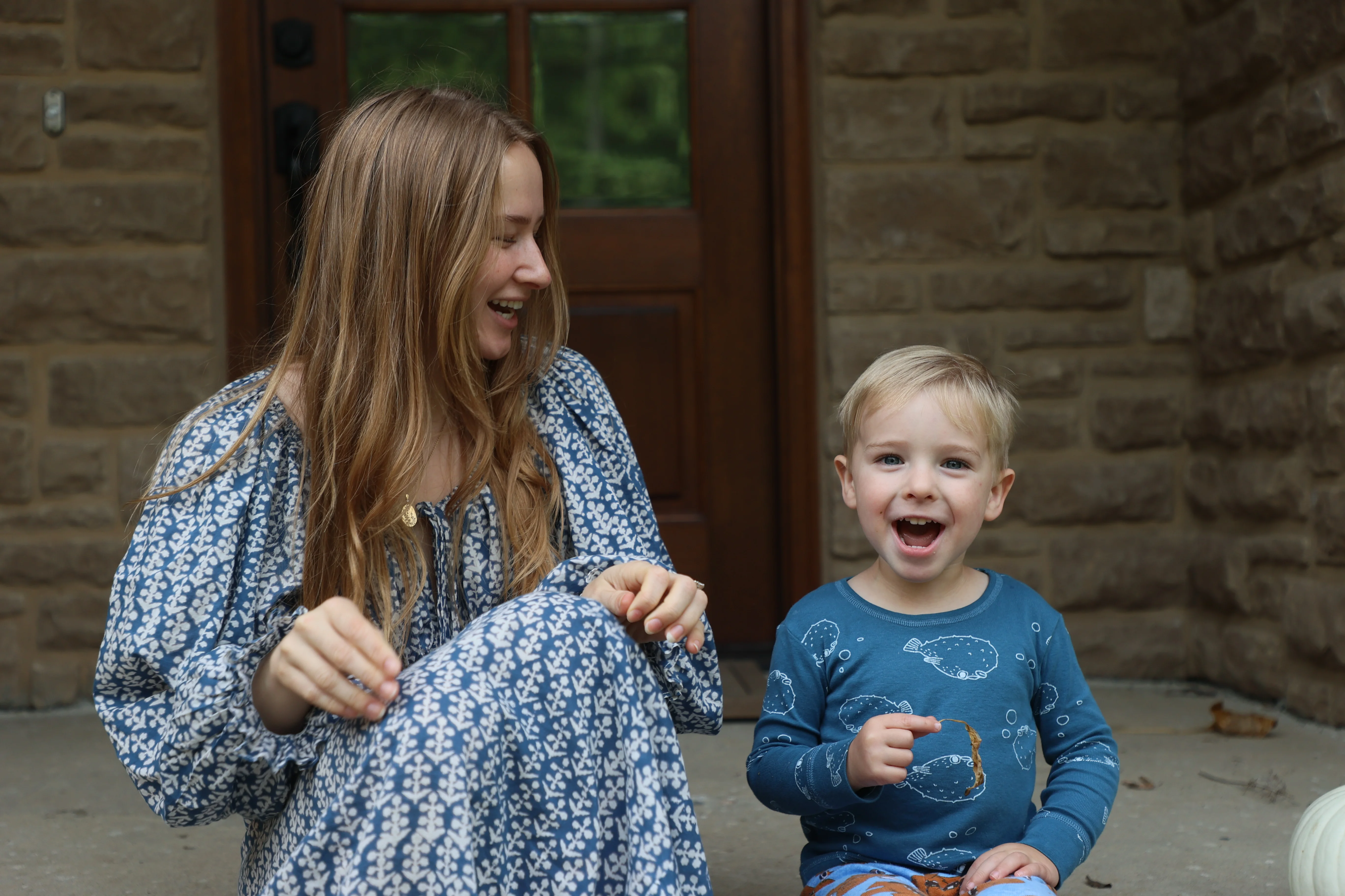 Leo with Grace on the front porch